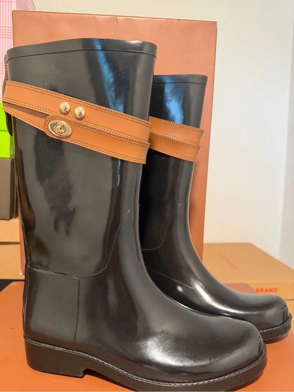Coach Black Rain Boots with Tan Strap and Gold Accent